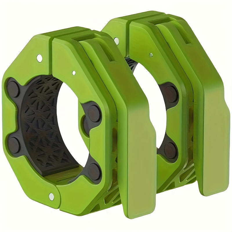 Two green barbell collars with black circular components on a white background