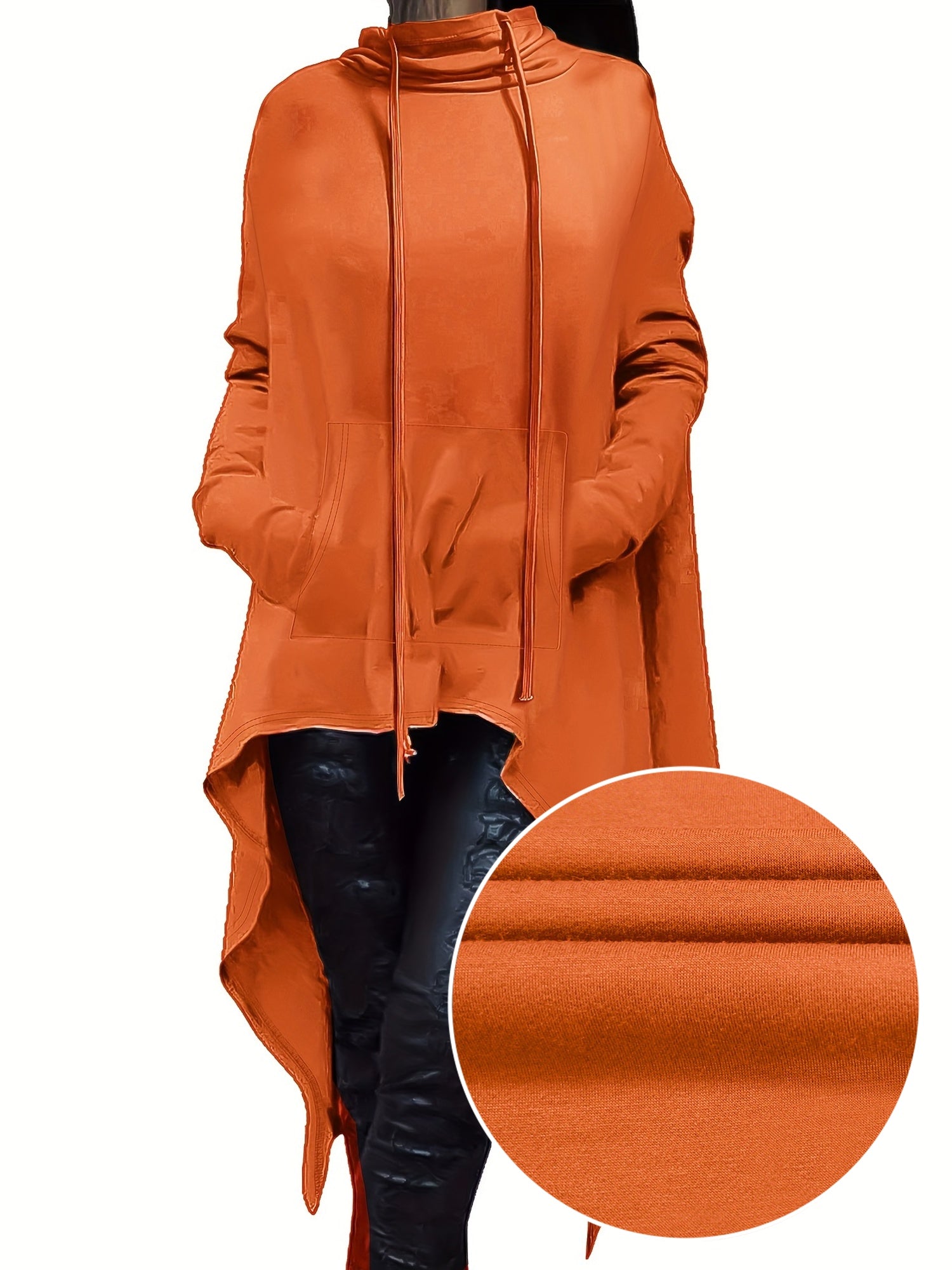 A woman wearing an orange women’s oversized hoodie sold by 100 Spartans