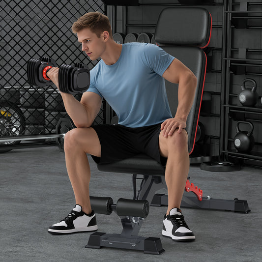 Man exercising with dumbbells in a gym setting
