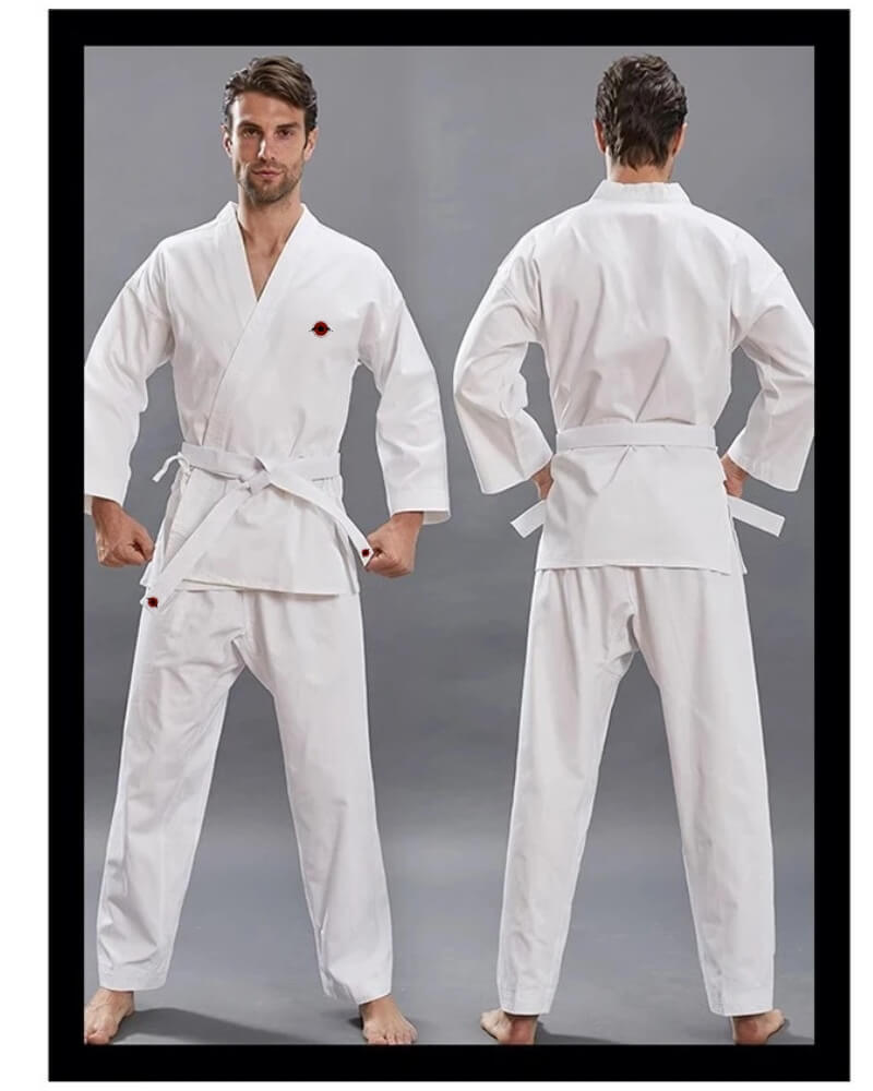 A man wearing a white 14oz Heavyweight Karate Gi sold by 100 Spartans