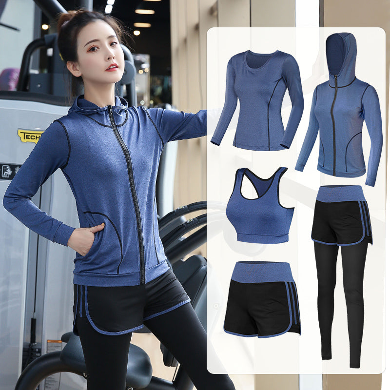 Woman wearing a blue 5 Piece Yoga Clothes For Women with gym equipment in the background