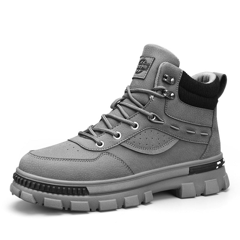 A grey Martin high top boot