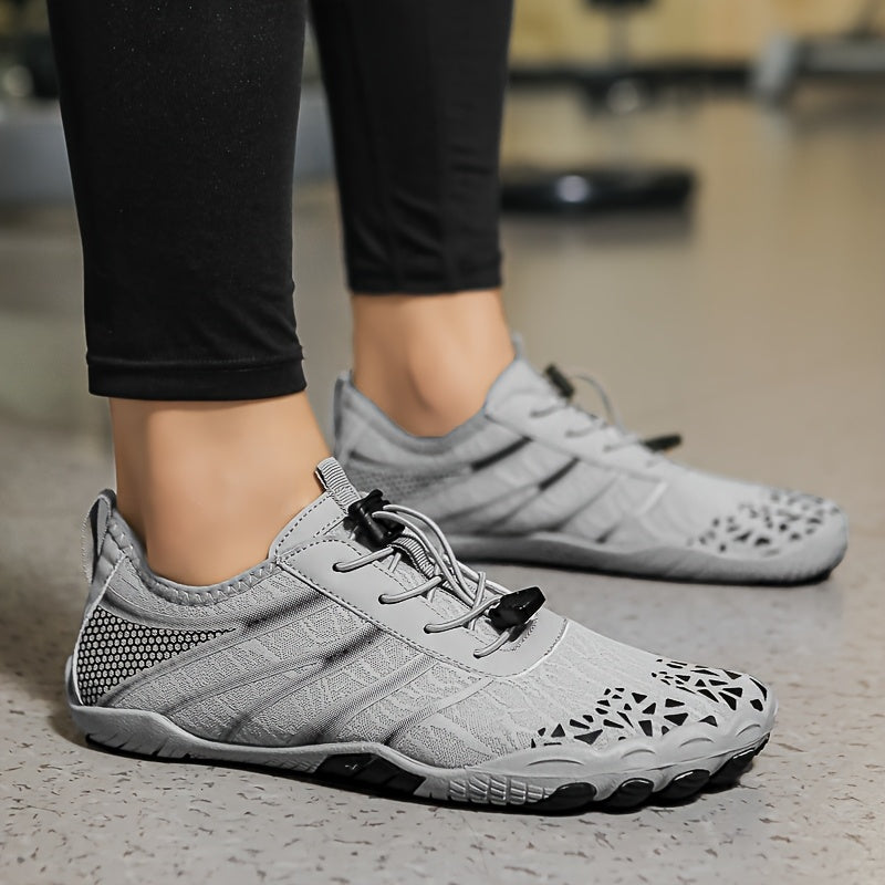 Gray deadlift shoes worn indoors on a neutral background