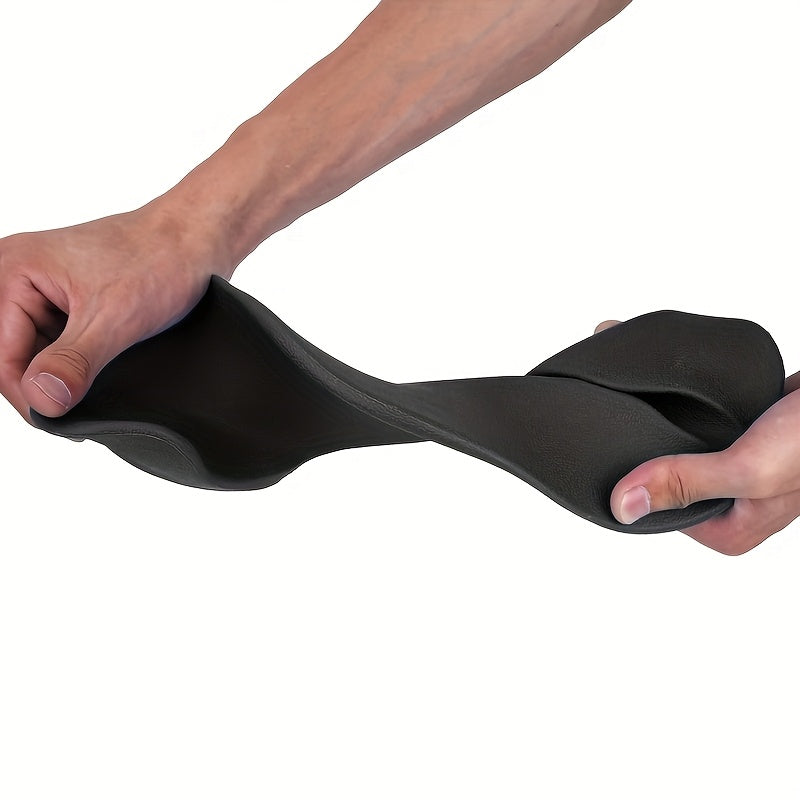 Person twisting and folding a flexible barbell neck pad against a white background