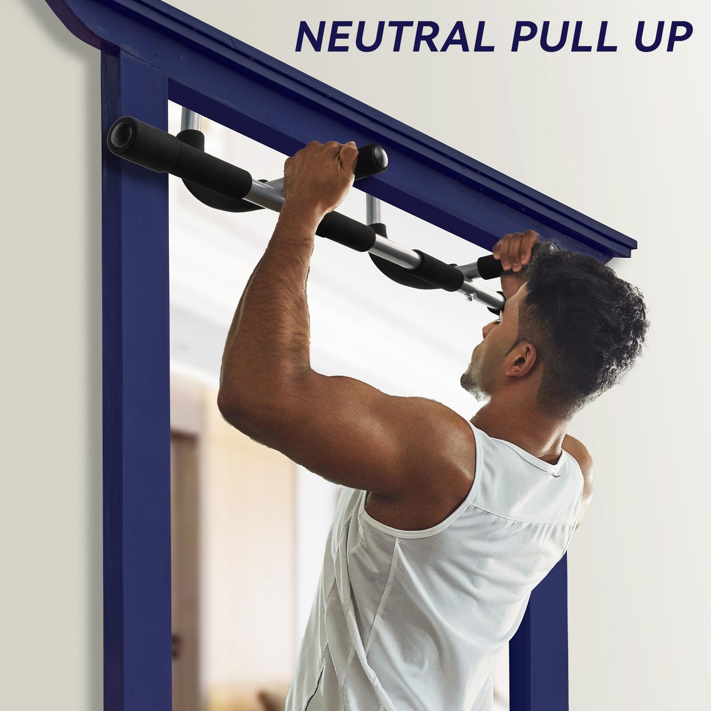 Man performing a pull-up on a pull up bar for doorway