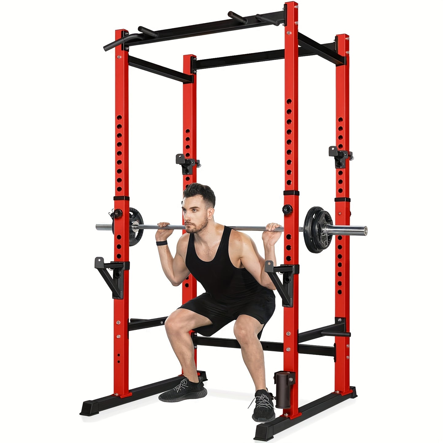 A man using a red and black squat smith machine with weights on a white background