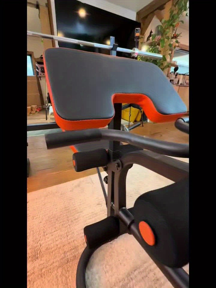 Black and orange adjustable weight bench in a home gym setting