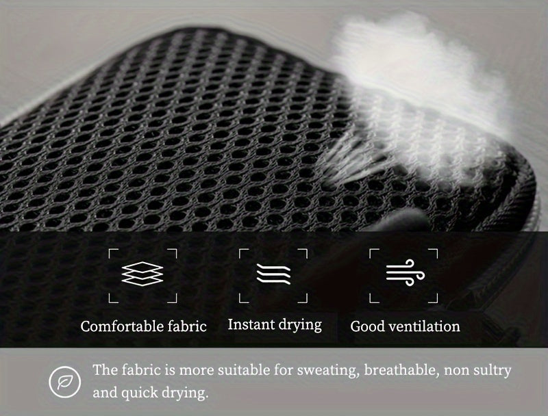 Textured fabric surface of a arm phone holder for running​ with features highlighted and a feather for scale.