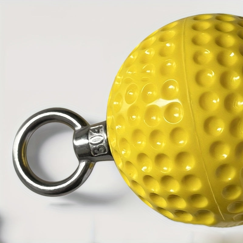 Yellow pull up grip ball with a metal ring on a white background