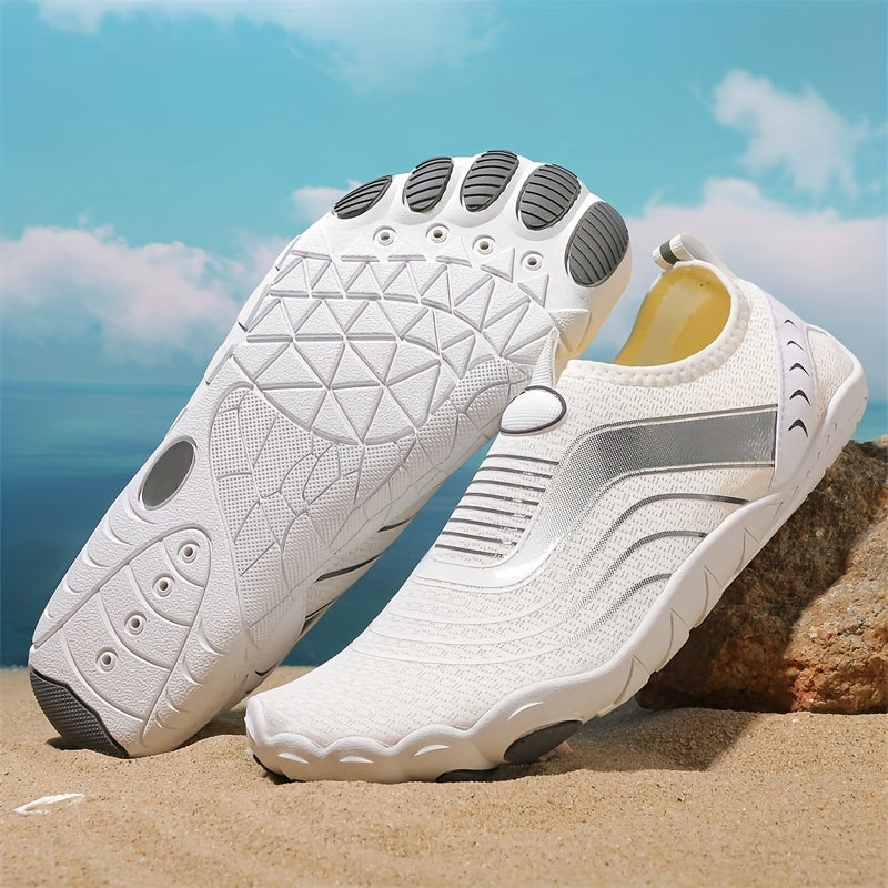 White barefoot shoes with unique sole design on a beach background