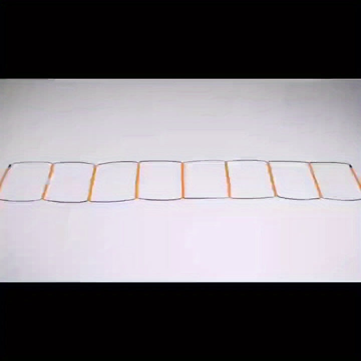 An orange agility ladder on a white background