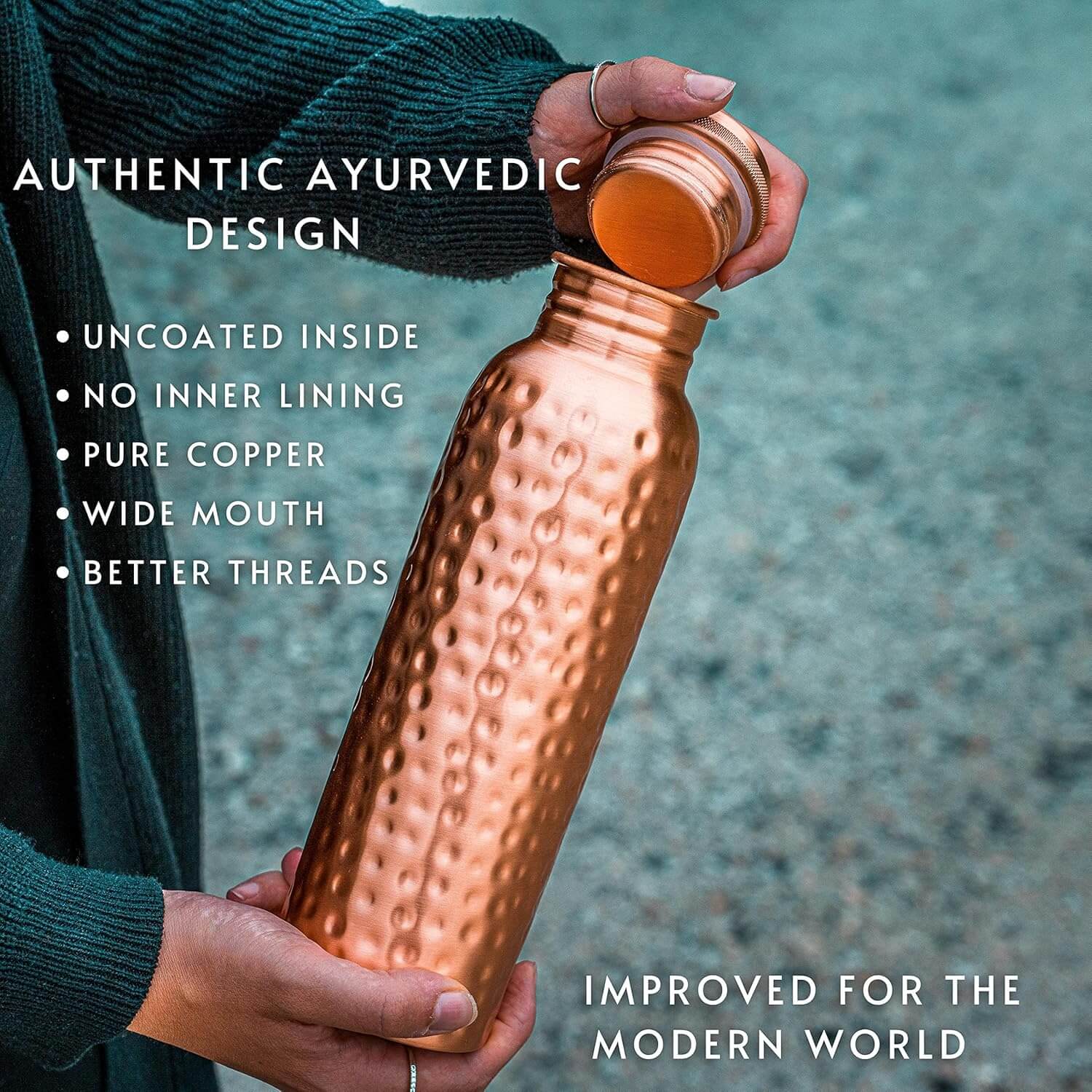 Person holding a copper water bottle with text highlighting features