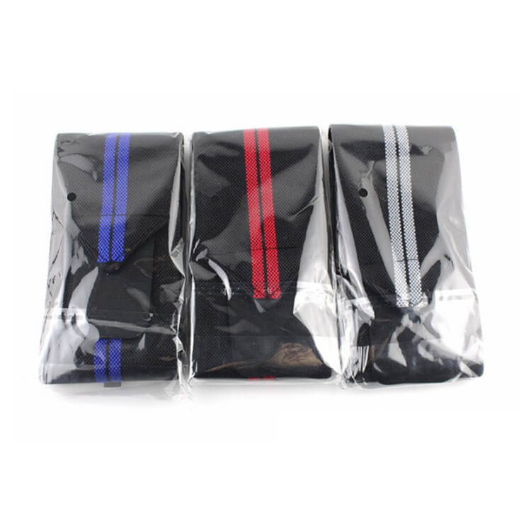 Three black bags with colorful stripes in clear packaging on a white background