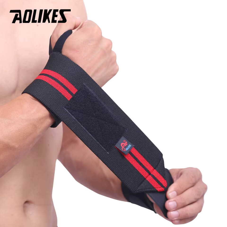 Person wearing a black wrist support with red stripes, featuring the brand 'AOLikes'.
