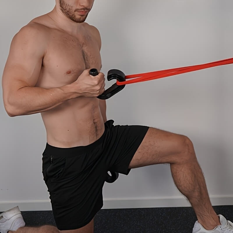 Man exercising with a resistance band and a pull up grip 