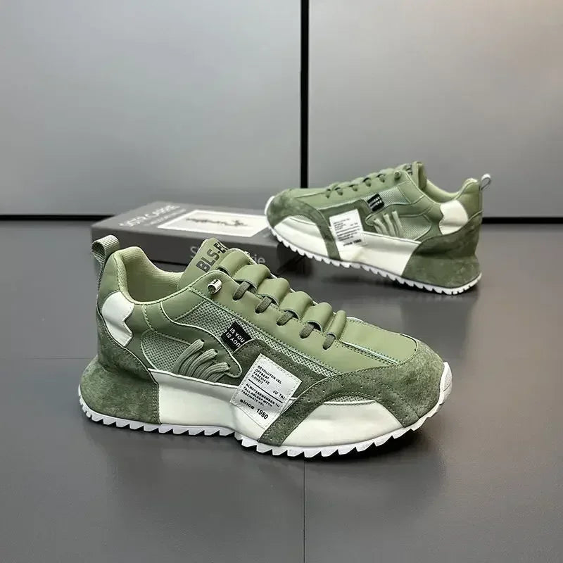 Green and white summer sneakers on a reflective surface with a neutral background