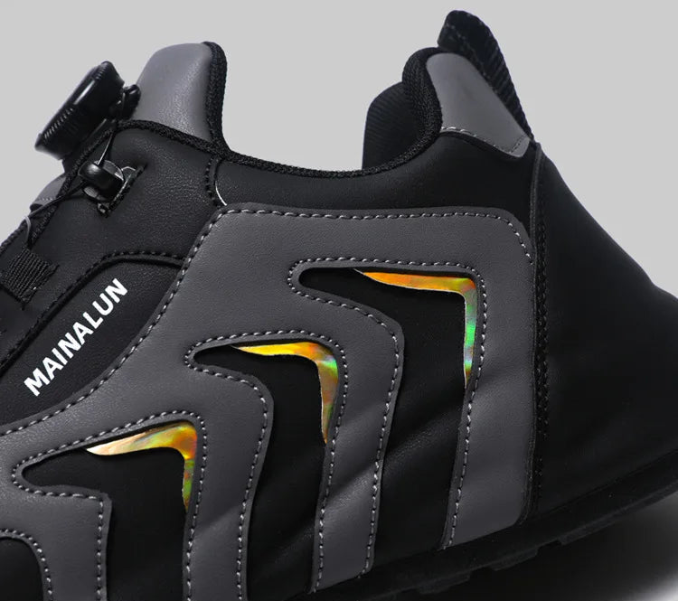 Black sneaker with visible brand name on a gray background