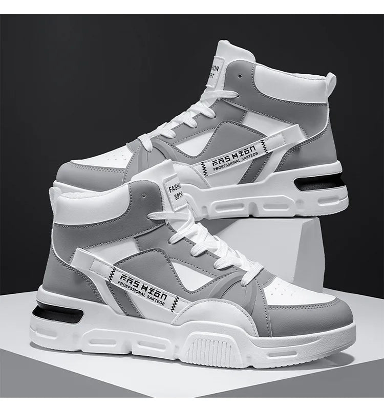 Gray and white high-top sneakers with brand logo on a reflective surface.