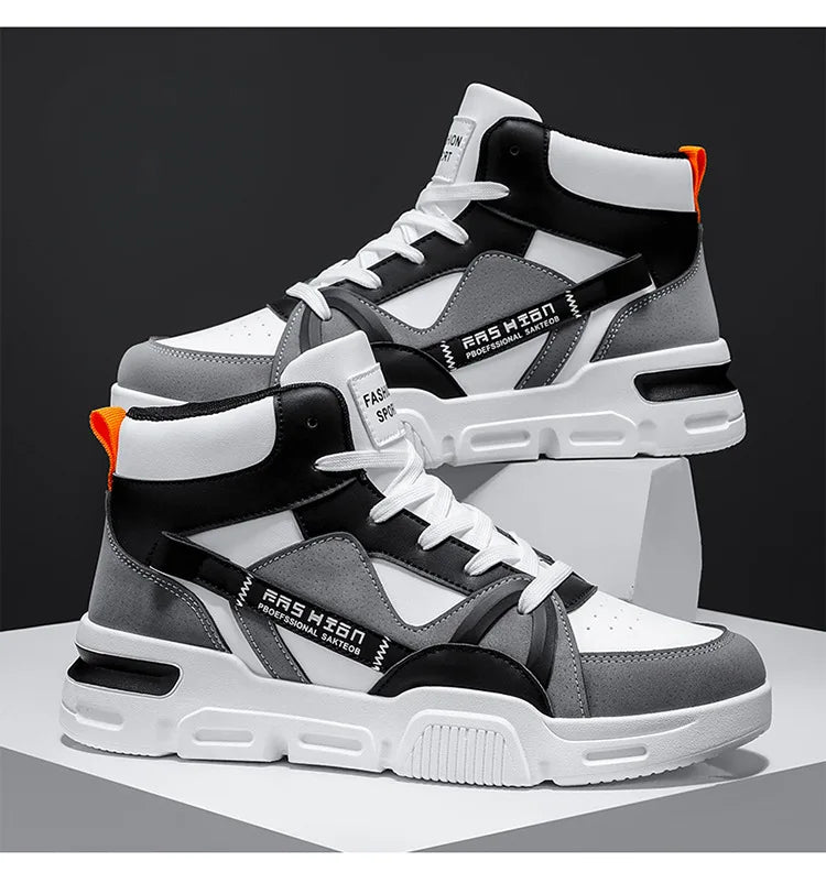 Pair of high-top sneakers with black, white, and gray design on a dark background