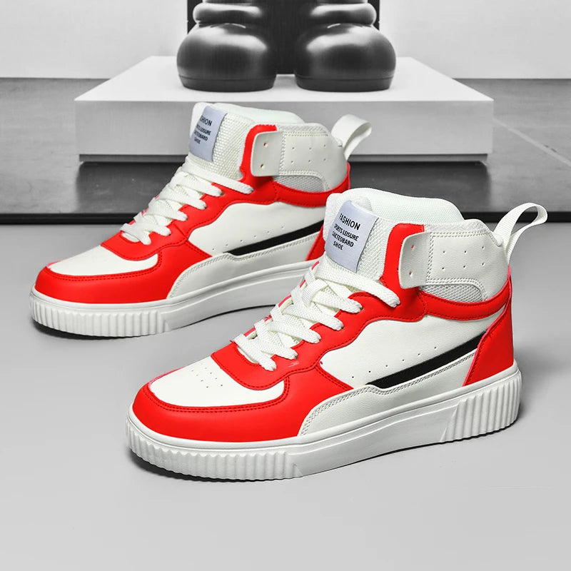 Red and white high-top sneakers on a gray surface with a blurred background