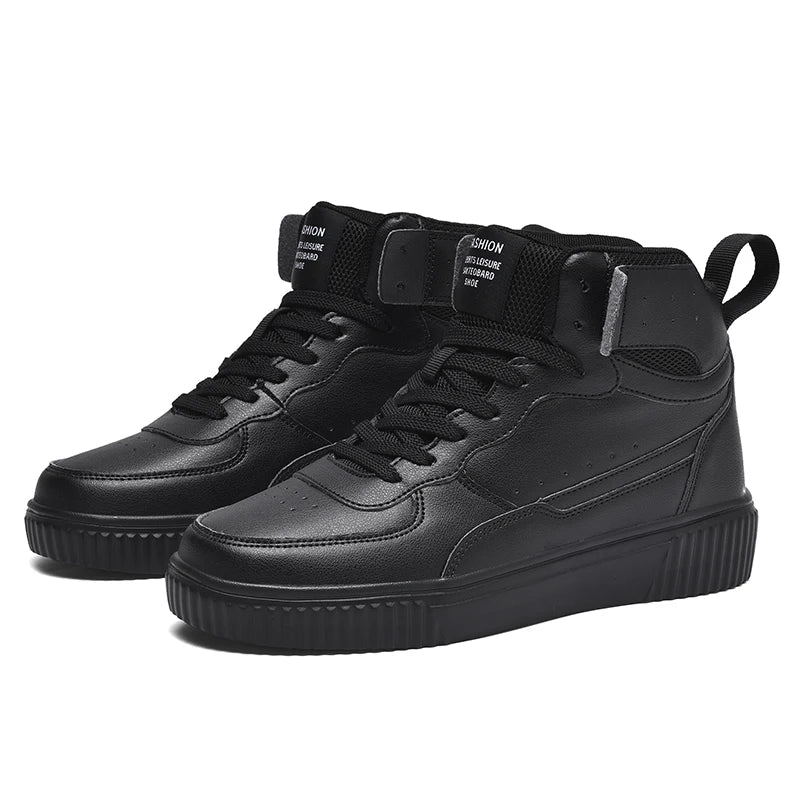 Pair of black high-top sneakers on a white background