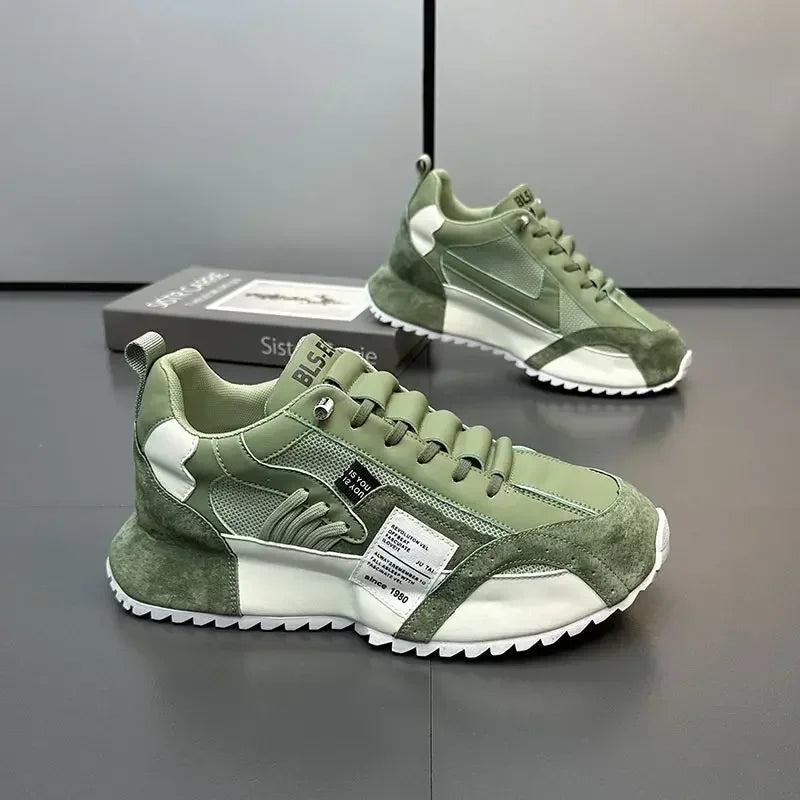 Green and white summer sneakers on a reflective surface with a neutral background