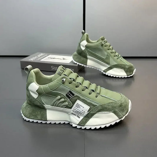 Green and white summer sneakers on a reflective surface with a neutral background