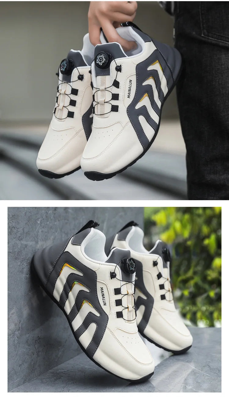 White and black athletic shoes with a brand logo on a gray surface.