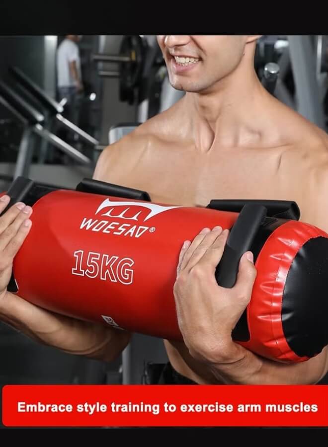 Person holding a red and black water weight bag​ in a gym setting.
