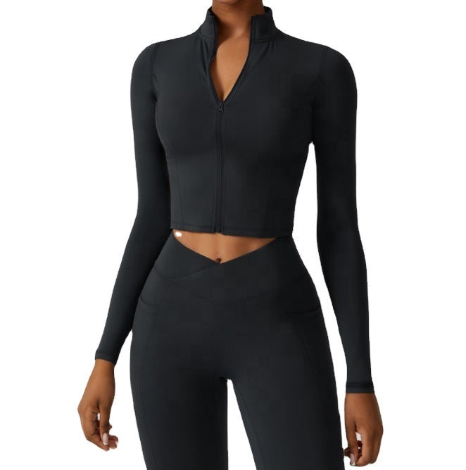 A woman wearing black womens zip up sweatshirt sold by 100 Spartans on a gray background   