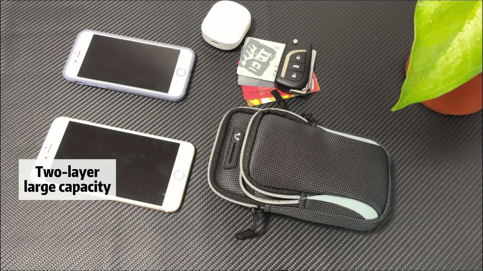 Black two-layered pouch with electronic devices on a textured surface