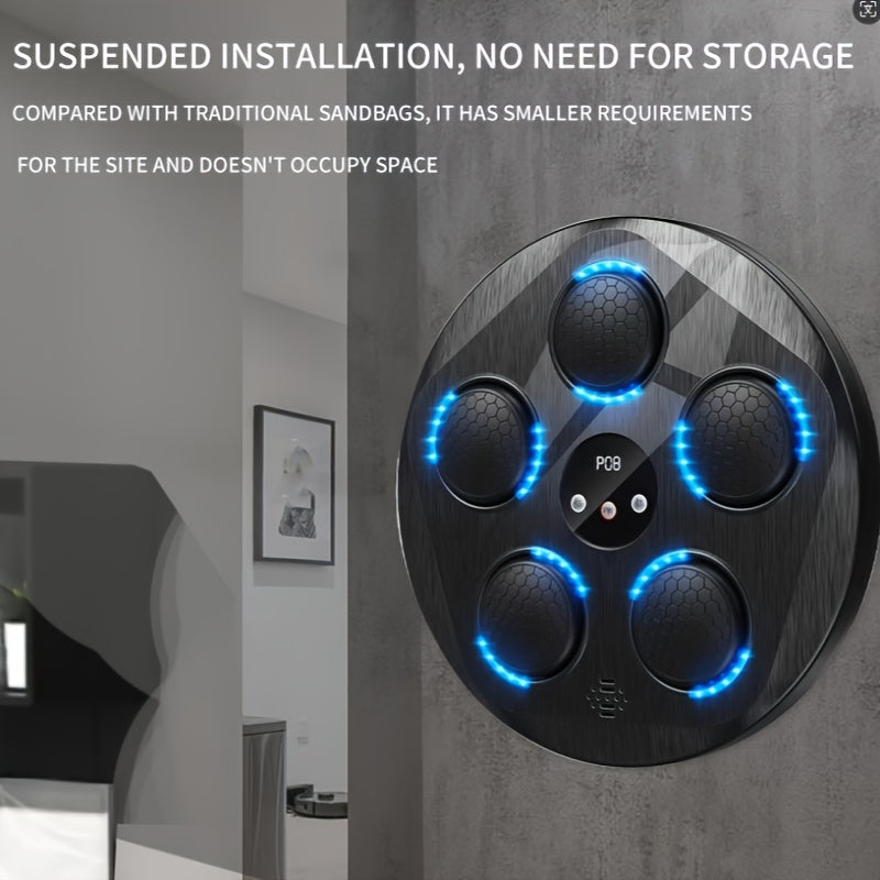Black circular boxing music machine with blue lights on a gray wall background