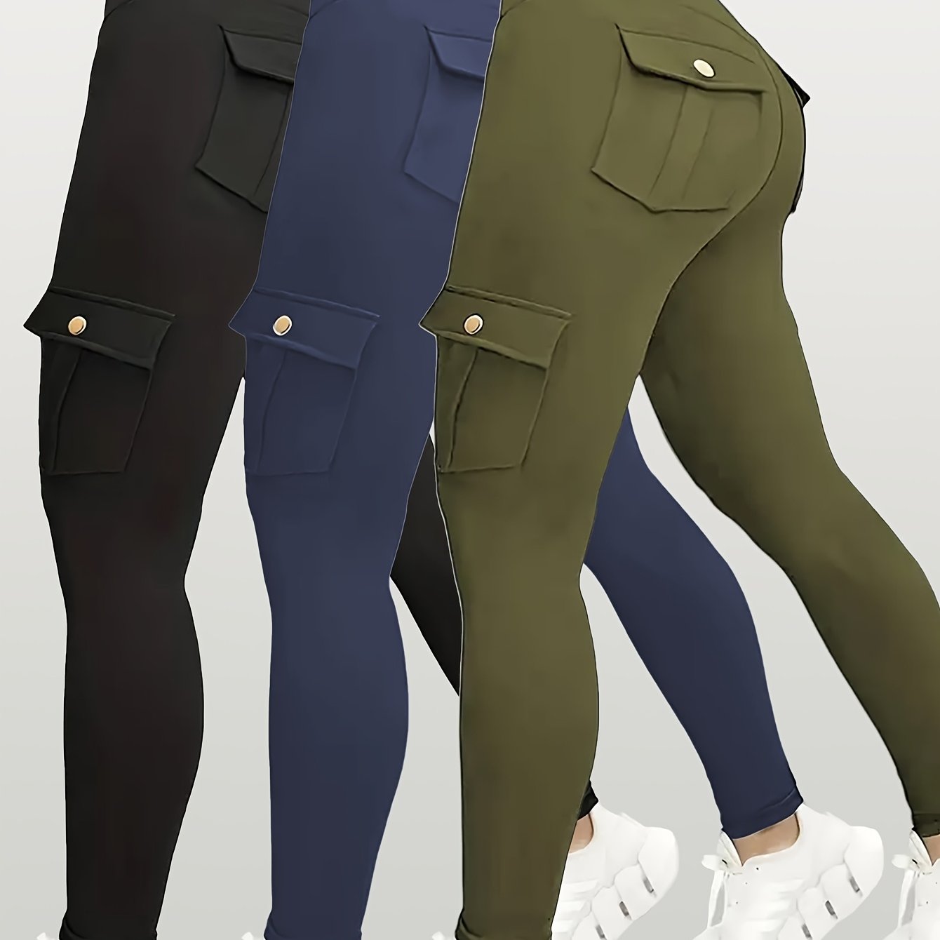 Three pairs of yoga leggings in black, blue, and green on a white background