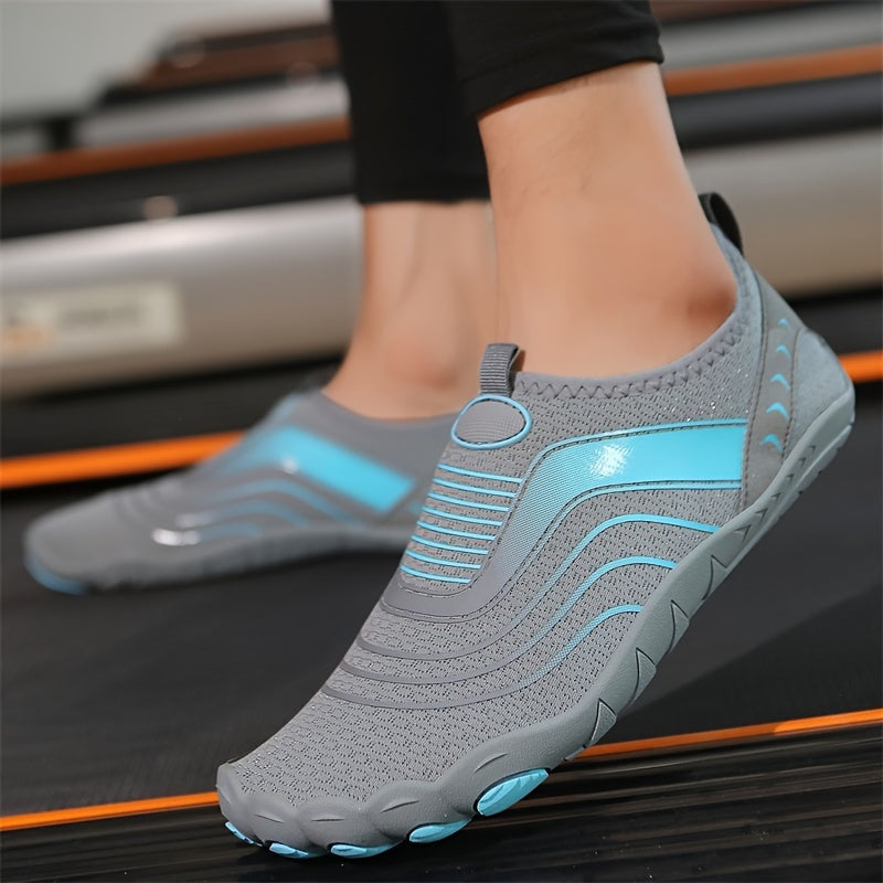 Gray water hiking shoes with blue accents worn on a treadmill.