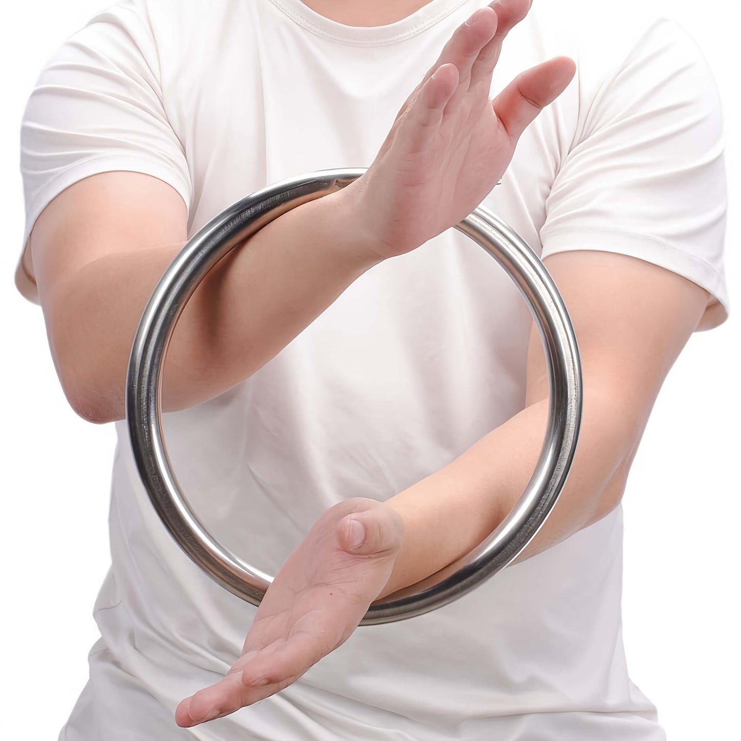 A person wearing a white t-shirt, while training with a wing chun ring.