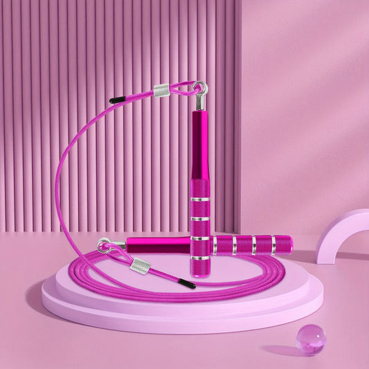 Pink adjustable skipping rope on a pink platform with a pink background