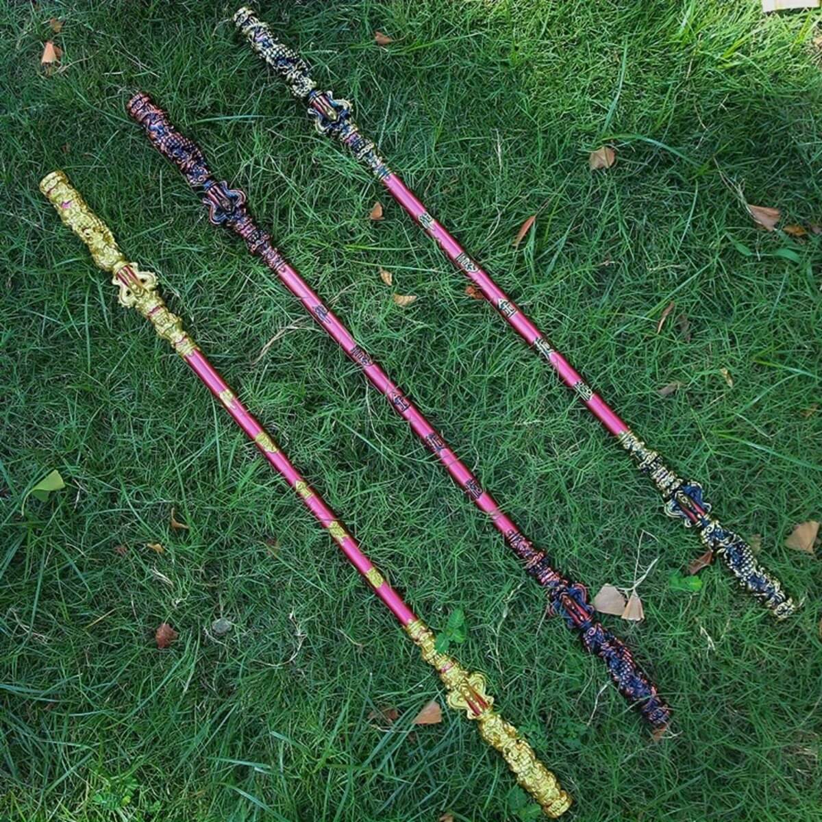 Sun Wukong Sticks with colorful patterns on a grassy background