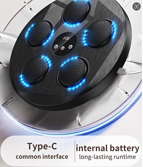 Close-up of a boxing music machine with glowing blue lights and text indicating Type-C interface and internal battery.