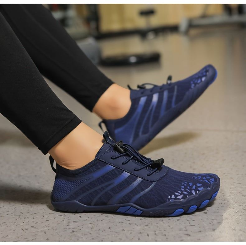 Person wearing blue deadlift shoes on a neutral background