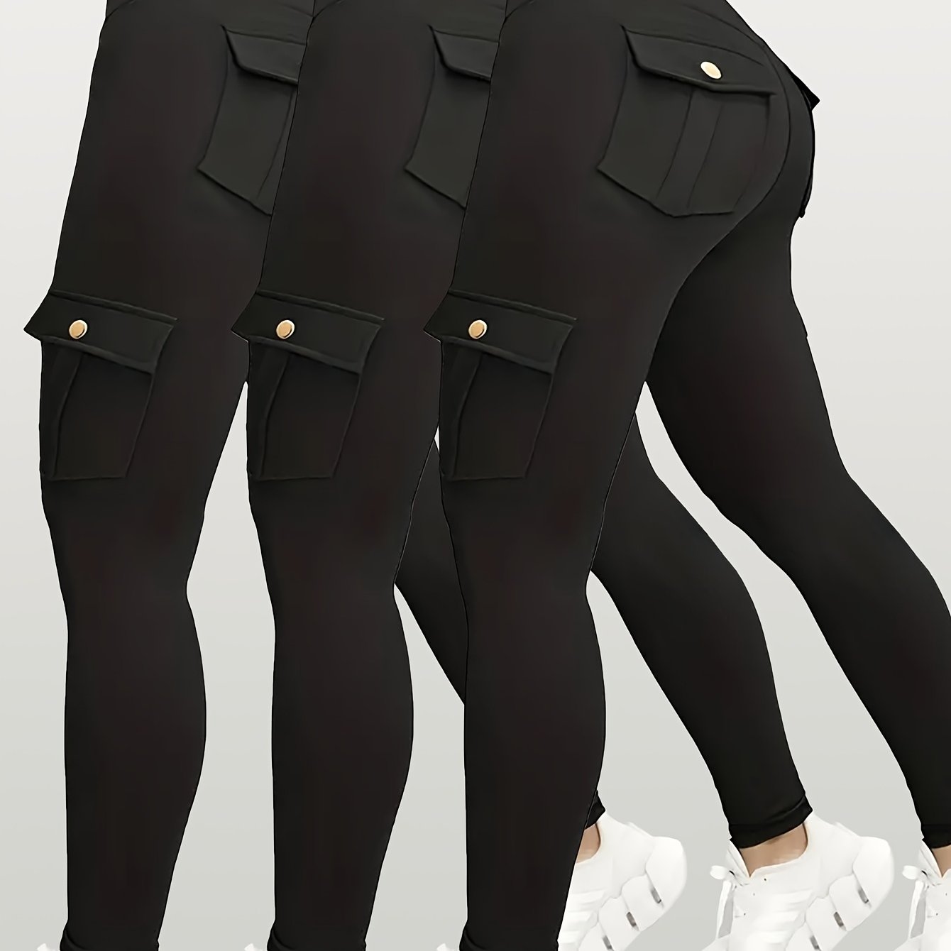 Black yoga leggings with pocket details on a light gray background