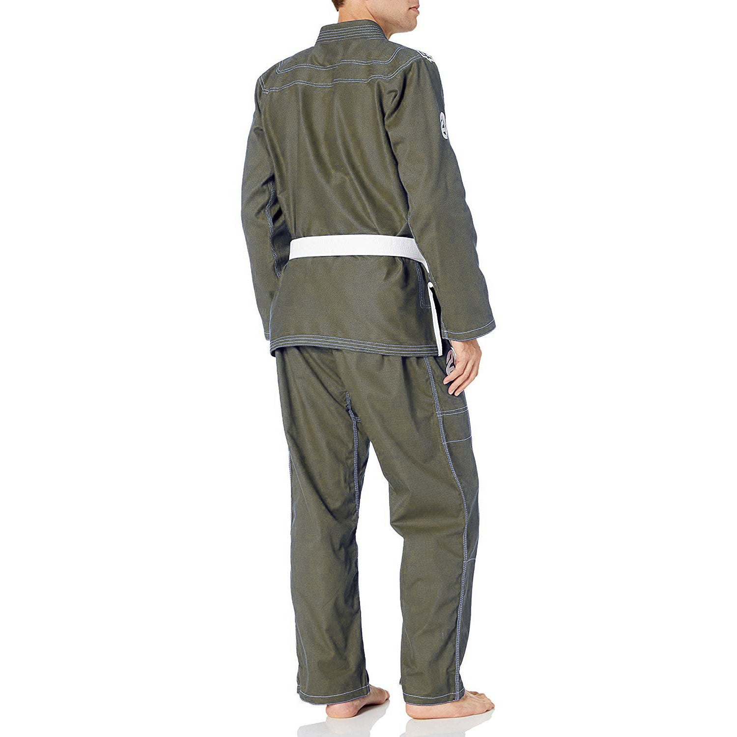 Person wearing a green martial arts uniform on a white background