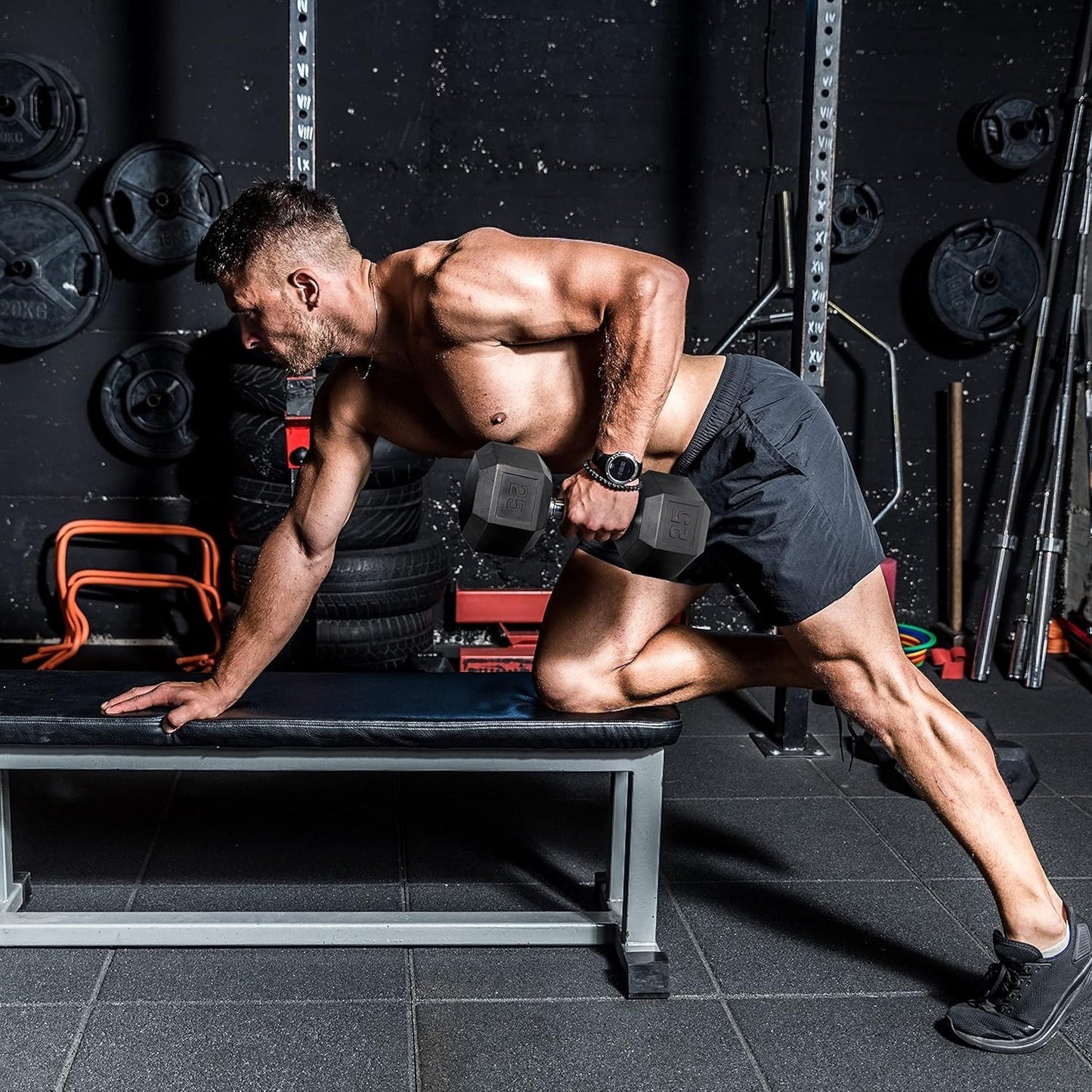 Man exercising with dumbbells in a gym setting