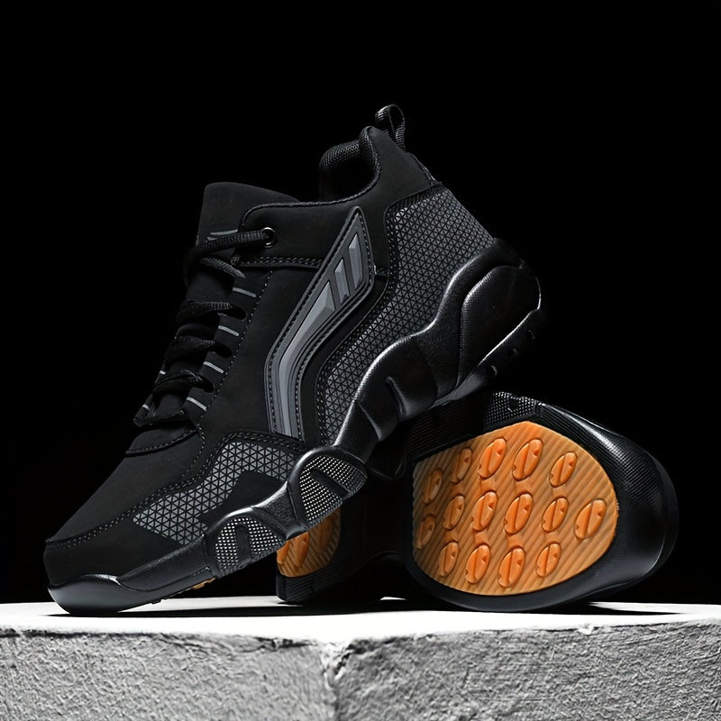 Black high-top sneakers with orange soles on a dark background