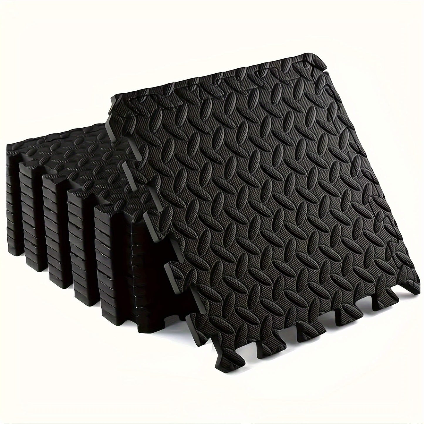 Black interlocking foam mats on a white background