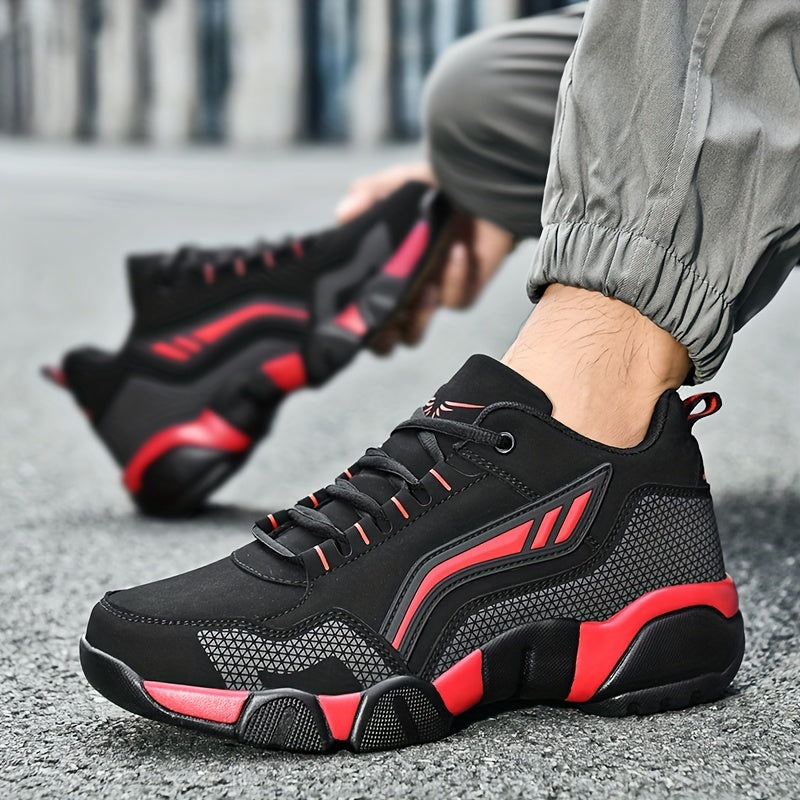Black and red athletic shoes worn by a person on a blurred street background