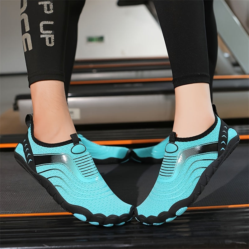 Water hiking shoes with black accents worn on a treadmill.