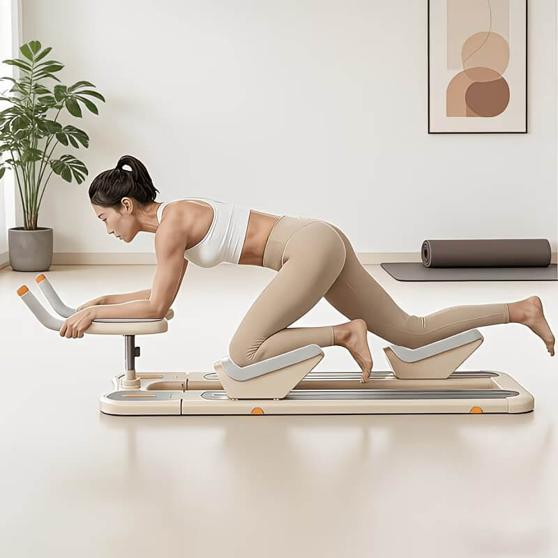 A woman working out with a crawl & spine twist and stretch trainer