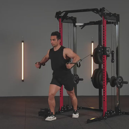 A man working out with an all in one smith machine sold by 100 Spartans