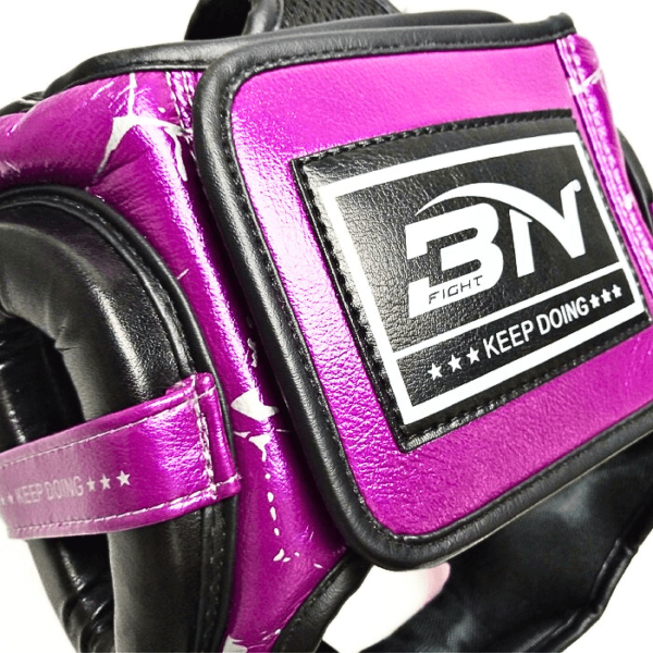 The back of a purple boxing head guard supplied by 100 Spartans that can be used for mixed martial arts, muay thai, and taekwondo