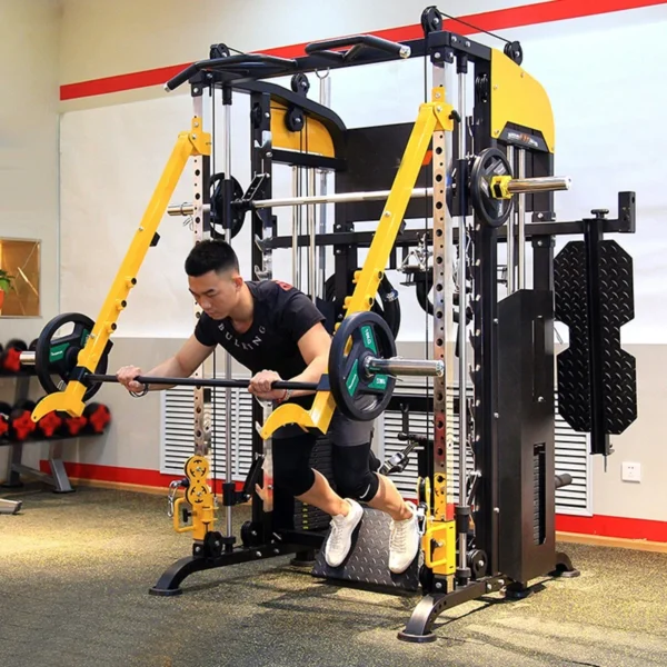 A man working out with a yellow counterweight smith machine sold by 100 Spartans